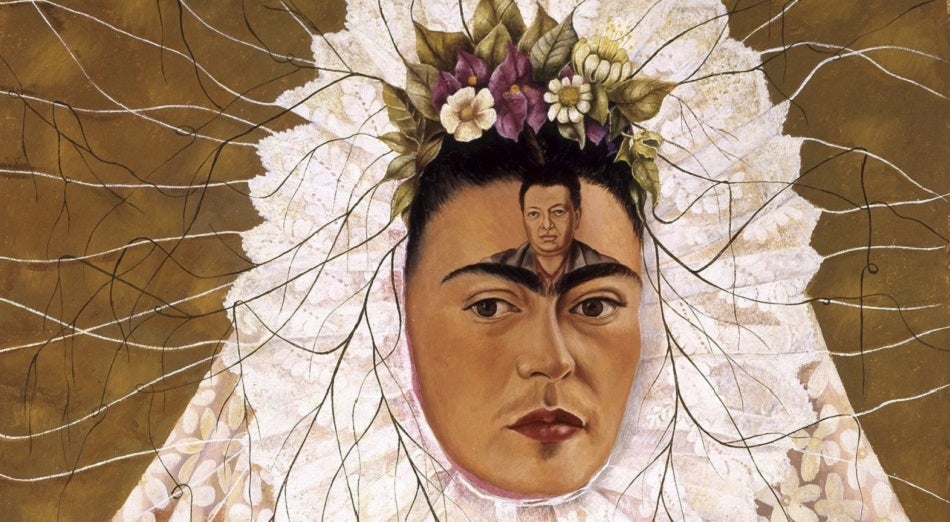 Frida Kahlo self portrait painting of her wearing a bridal vail and her fathers face on her forehead